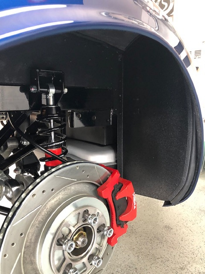 Driver wheel well