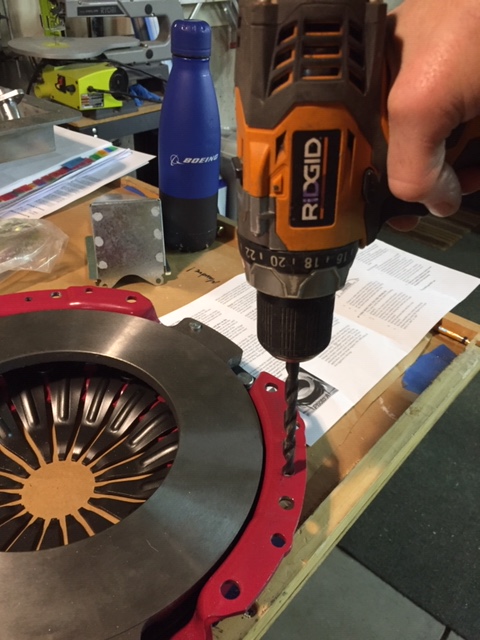 Drilling out for dowel pins in press plate