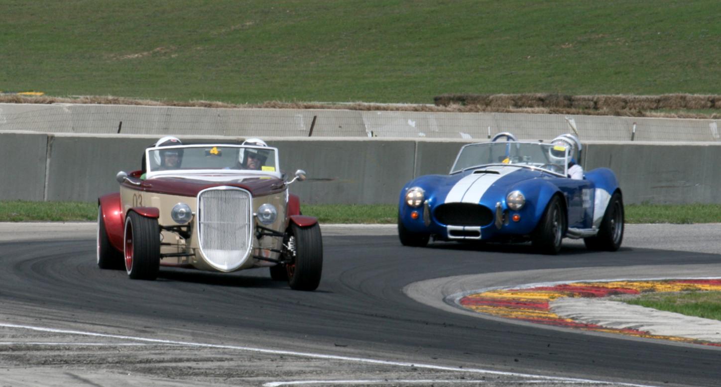 Lee and Tom Turn 8, Road America - 2012 NorthWoods Shelby Club.