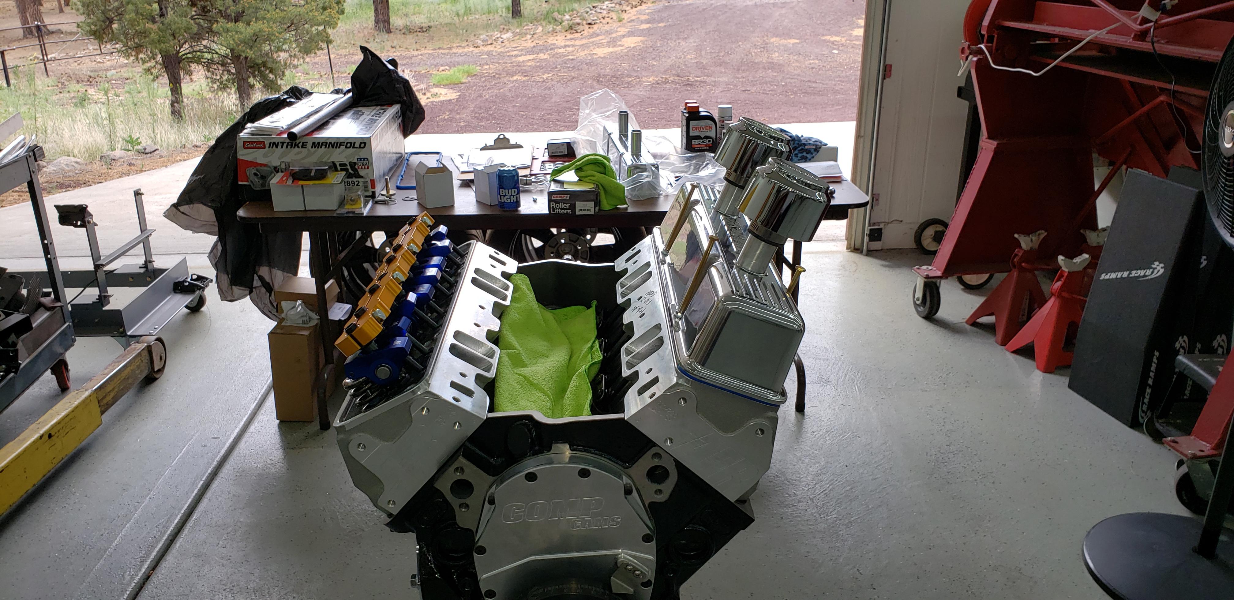 RIGHT CLICK THEN CLICK VIEW IMAGE 

Heads on and studs torqued.  Valve to piston clearances checked, custom length pushrods installed and guides adjusted, rockers installed and valves adjusted, stud girdle installed and clearances checked.  Next is the intake.