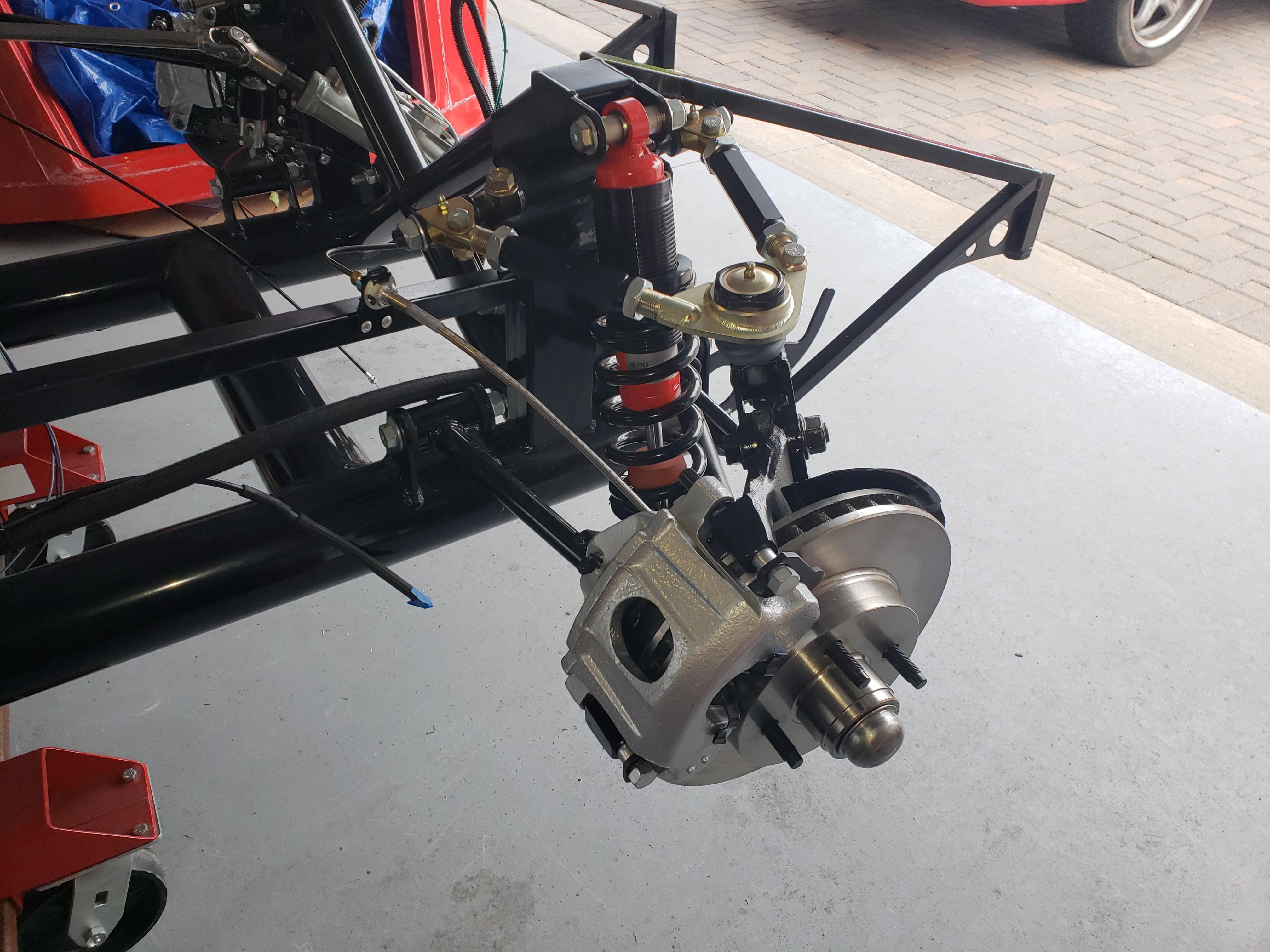 Passenger side front suspension
