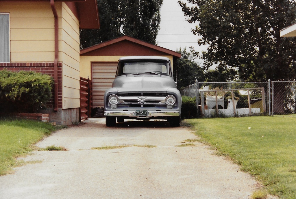 01_Ol Blue: Love at first sight!  This is a picture of this 1956 Ford Truck that I took from the road.  I'm about to go offer this guy some cash for it, no for sale sign, but everything is for sale, right?