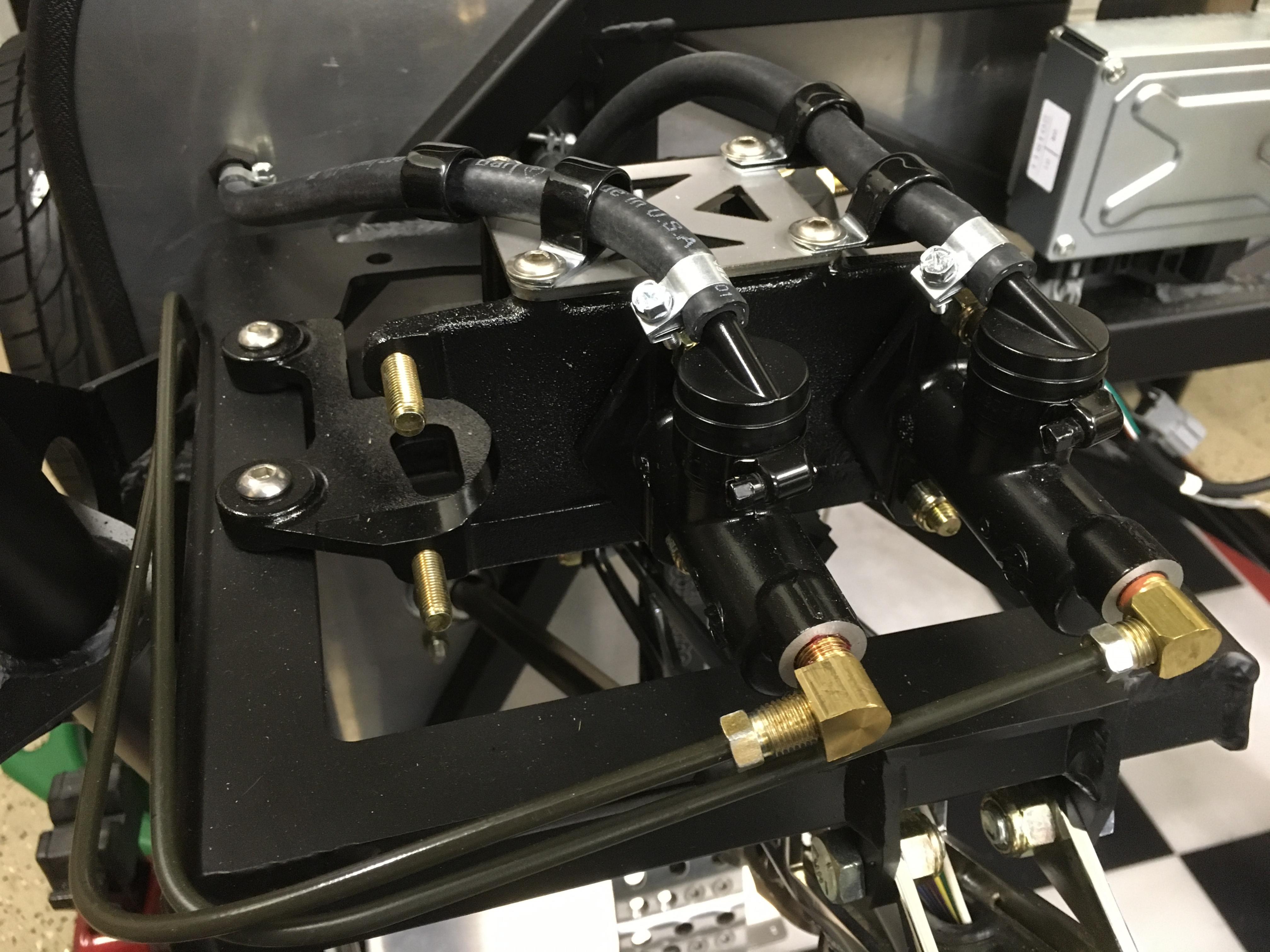 Pedal box master cylinders
