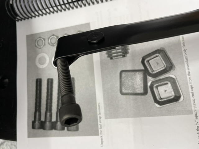Fuel tank strap fastener