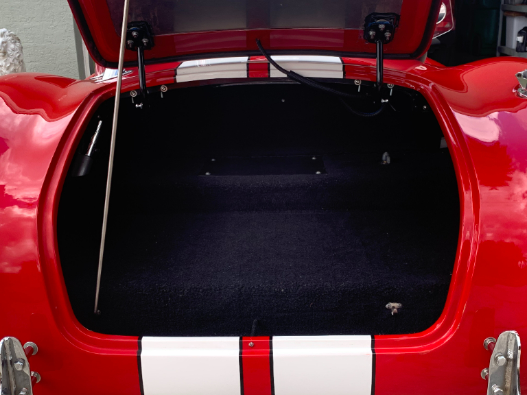 Breeze trunk lid prop rod kit.