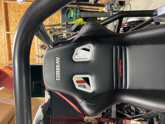 Corbeau seat in driver position showing ear outside of frame