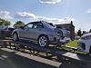 Rear window, rear bumper and passenger side skirt were inside at delivery.