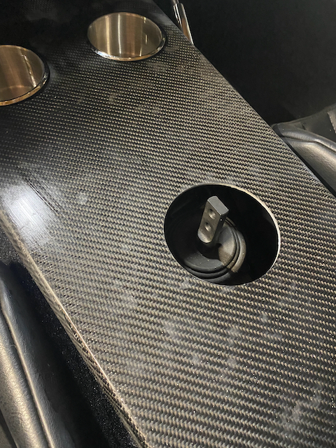 All Photos   1 of 1 (3After cutting the holes and 800 grit sanding before the matte clear coat. I dampened the tunnel to pop the carbon fiber out.
