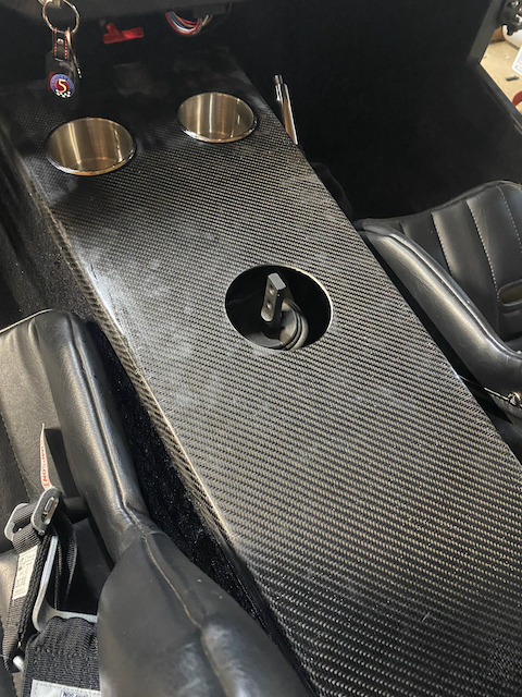 All Photos   1 of 1 (2After cutting the holes and 800 grit sanding before the matte clear coat. I dampened the tunnel to pop the carbon fiber out.