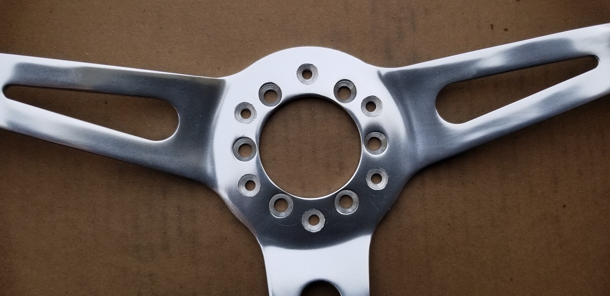 20210323 - Tapered the newly drilled holes.  The bottom one got a little garbled by the drill bit.  I'll try and clean it up with a Dremel and a tapered grinding stone upon final assembly.