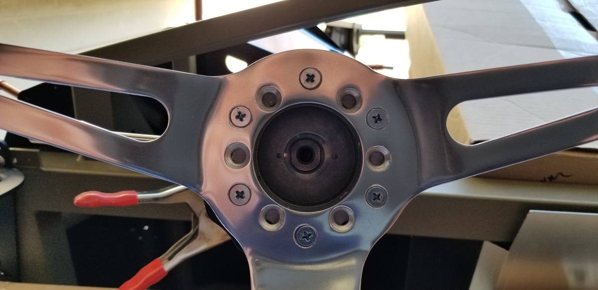20210408 - Getting the steering wheel on the shaft was no small task.  I tried to file and clean it up, but didn't want it loose at all.  It's on there and probably not coming off to easily.