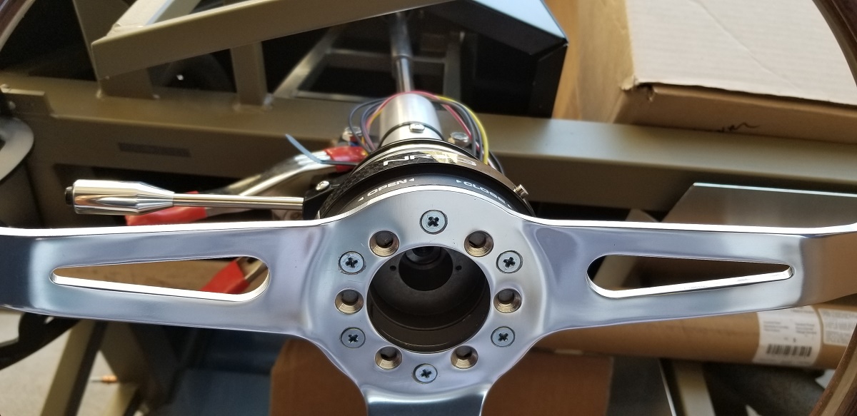 20210408 - Steering wheel is done.  
*NOTE: I am going to swap out the Phillips screws with hex stainless one's on for final assembly.  Also, I will try clean up the very bottom hole, that and will countersink them another mill or so.