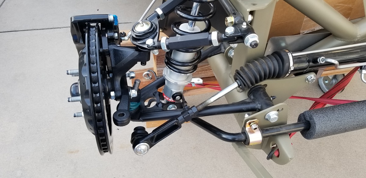 20211128 - Okay, getting them all back together.  Notice that I hadn't had anything officially torqued except for the wheel and brakes, and these steering arms.  It should be correct now.