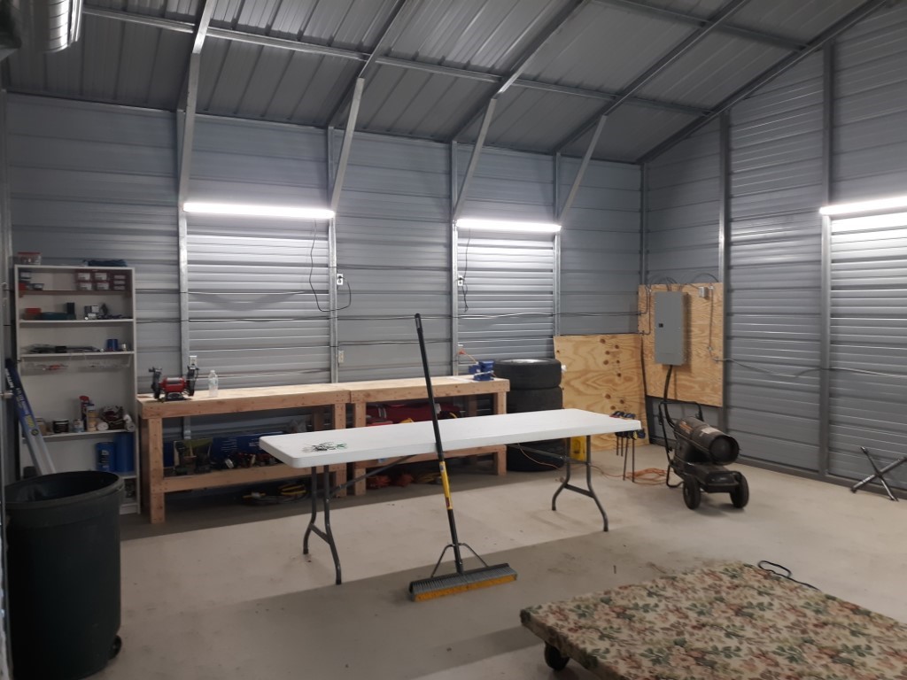 elect 3
West wall 2 lights and 4 outlets. Benches and storage