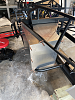 Passenger foot box drilled