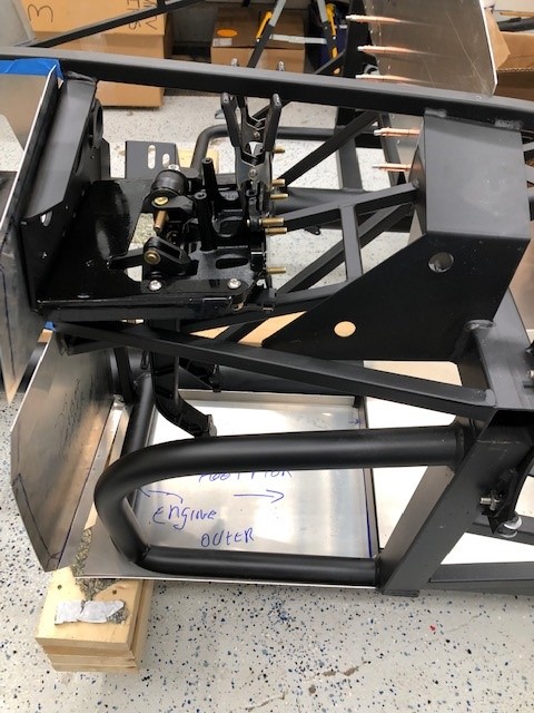 I wanted to see how the peddle box would mount in the Driver side area so I attached the peddle box to the mounting plate and used some spare nuts to tighten it up to the chassis it all fits which is a good thing.  I also slid the mounting brace onto the studs and clamped it on to see approximately were it would attach to the frame rails.  Not drilling that yet.  I'm installing Forte's hydroboost power brakes so I want to leave this area open till those parts arrive.