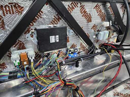 electronics mounted on rear firewall