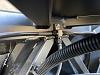 rear brake line a cross member