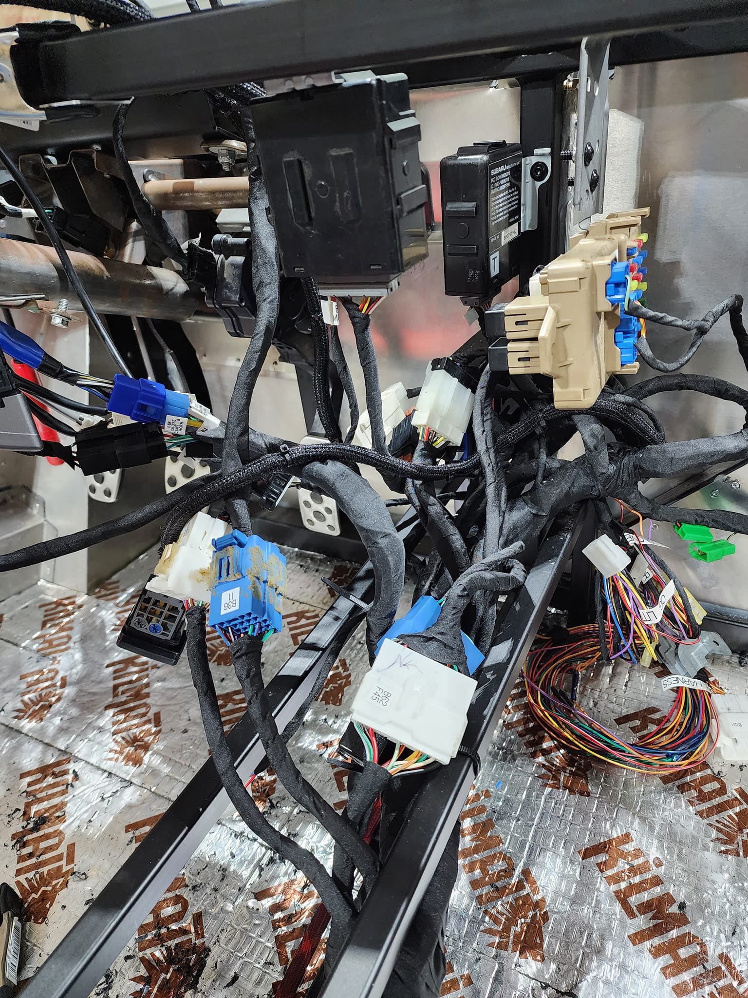electronic boxes mounted under dash