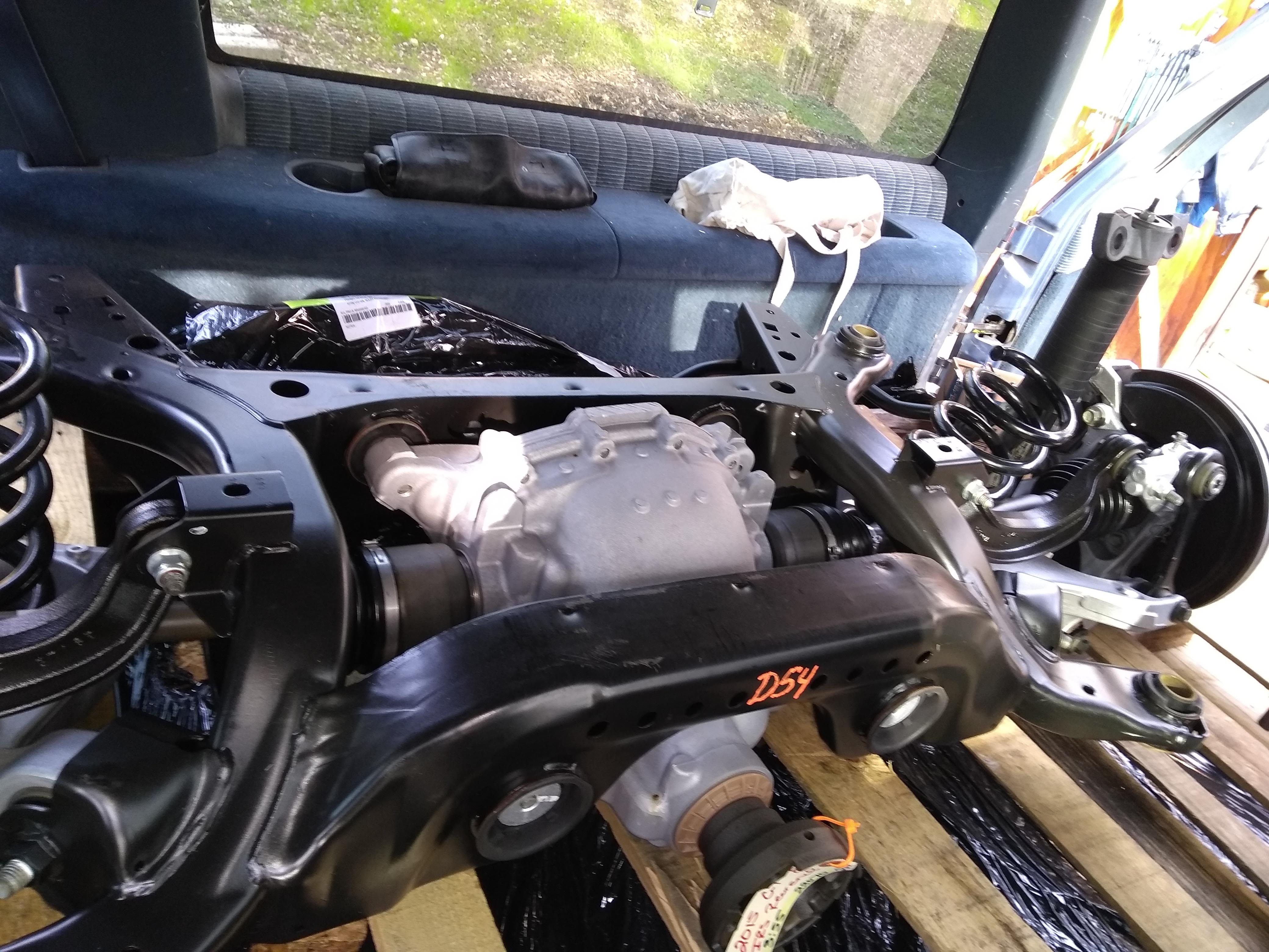 2015 Mustang drop out with 3.55 pumpkin, brakes, e-brake cables & knuckles. Everything else goes to the recycler. Hurts to pay for shipping that much metal to just toss out a majority of it.