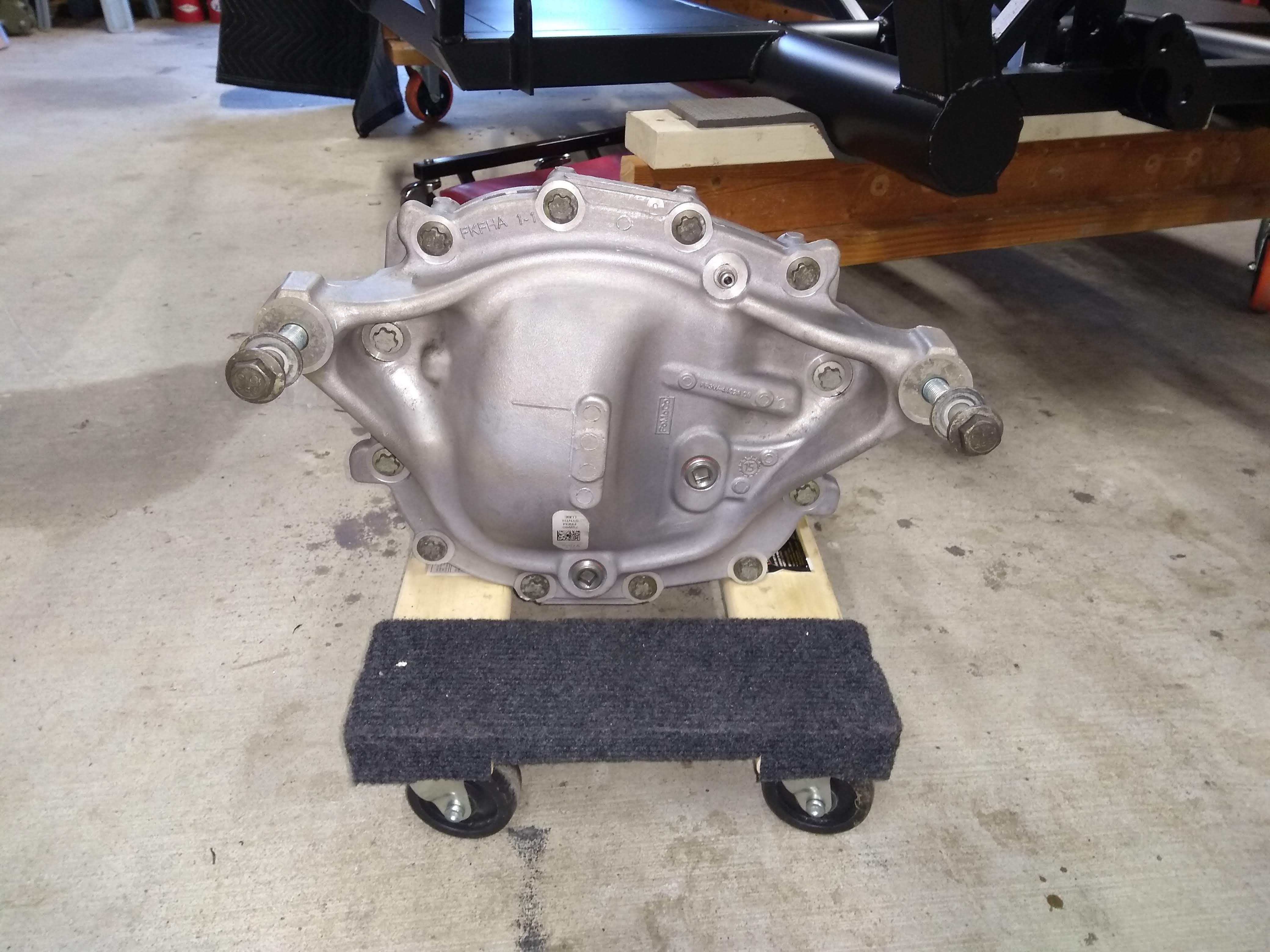 3.55 pumpkin waiting on a POR-15 treatment before being installed.