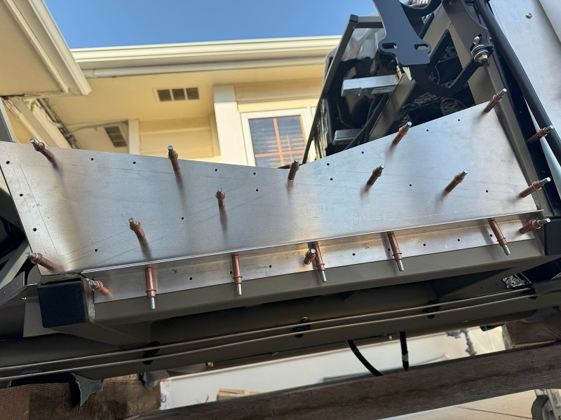 Passenger side outer lower backet added to close out all heat access from side pipes.