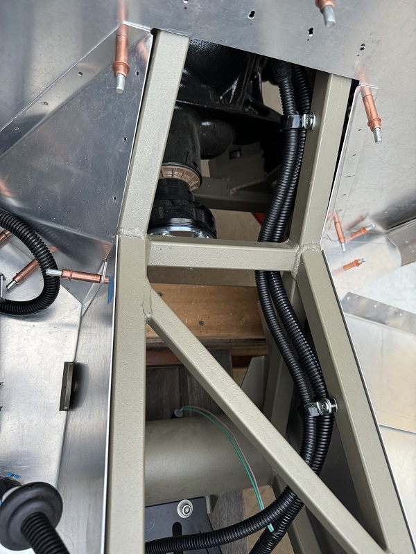 Adding cushion clips through the transmission tunnel.