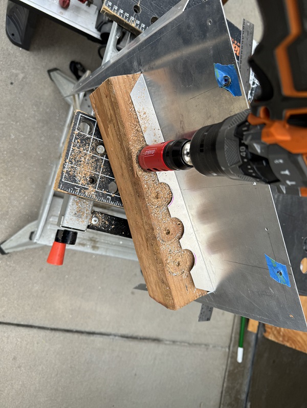 Drilling the holes.