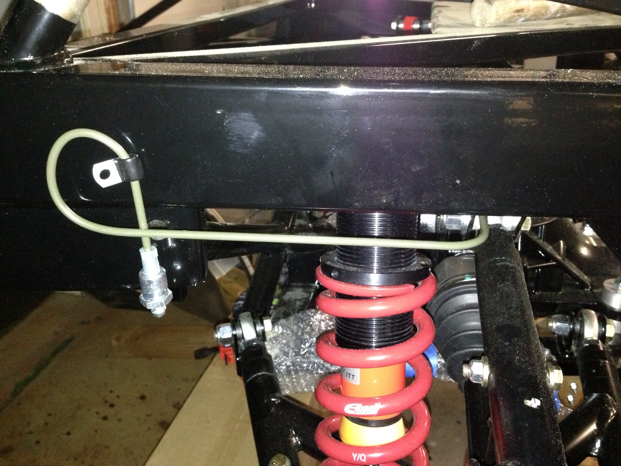 PS brake line came across above the differential and then to the rear over the suspension.