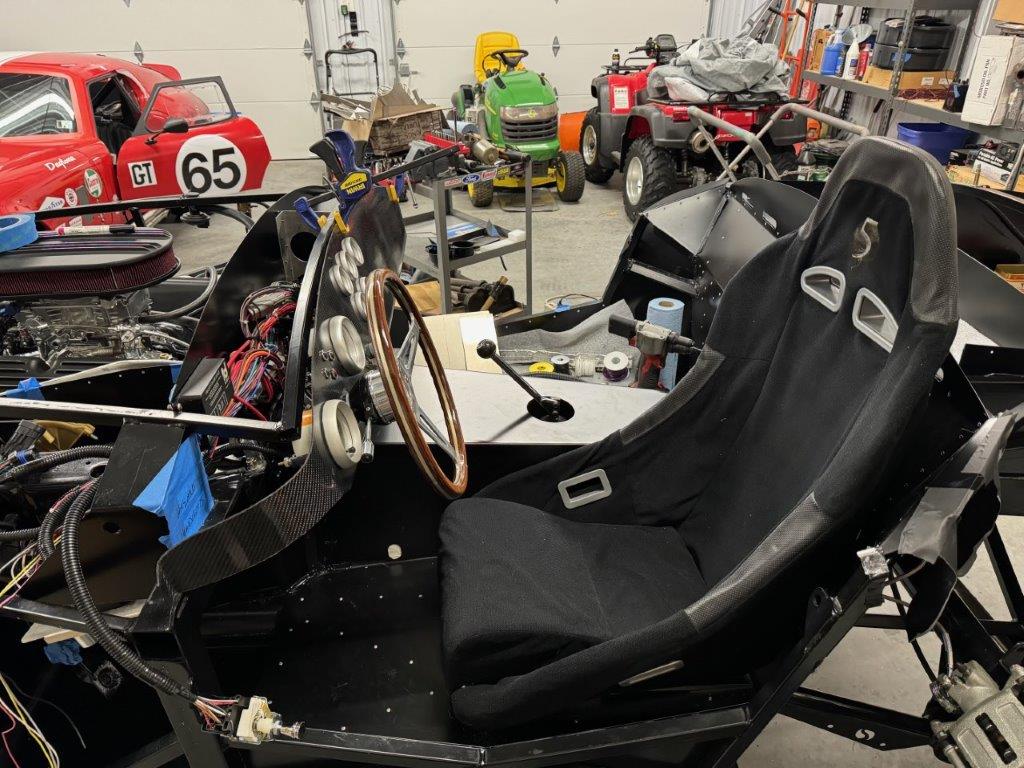 Cockpit with seat positioned