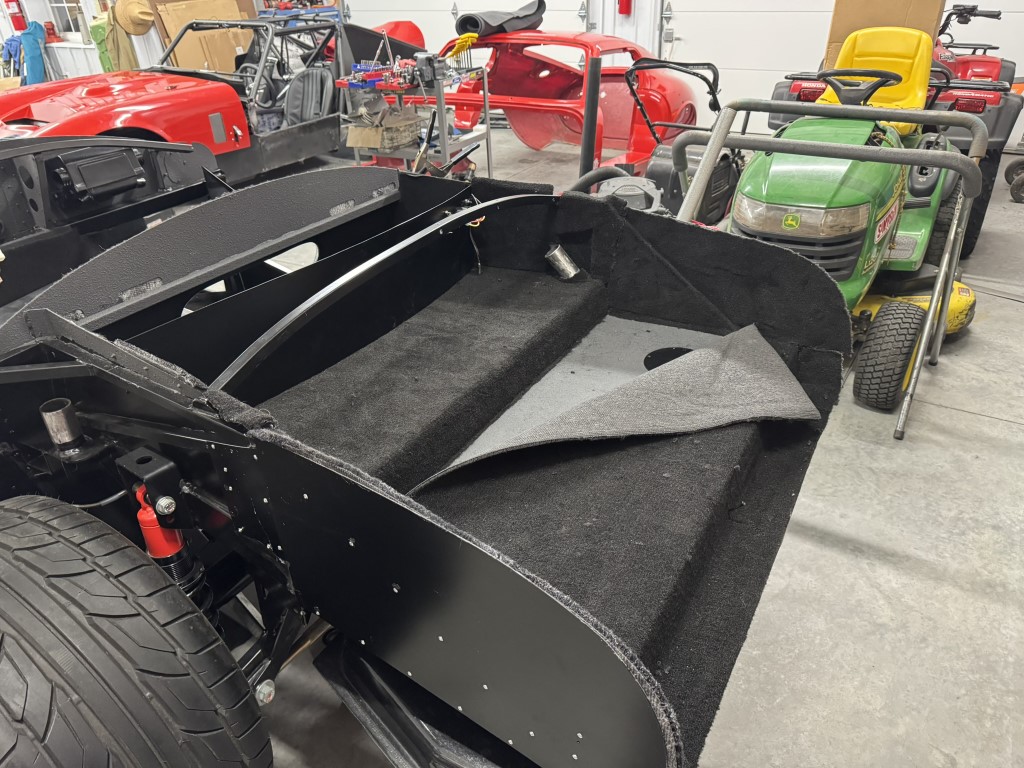 Trunk Carpeted Tank Access