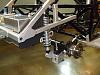 revised 4 link for instant center correction and relocated shock mounts to clear body