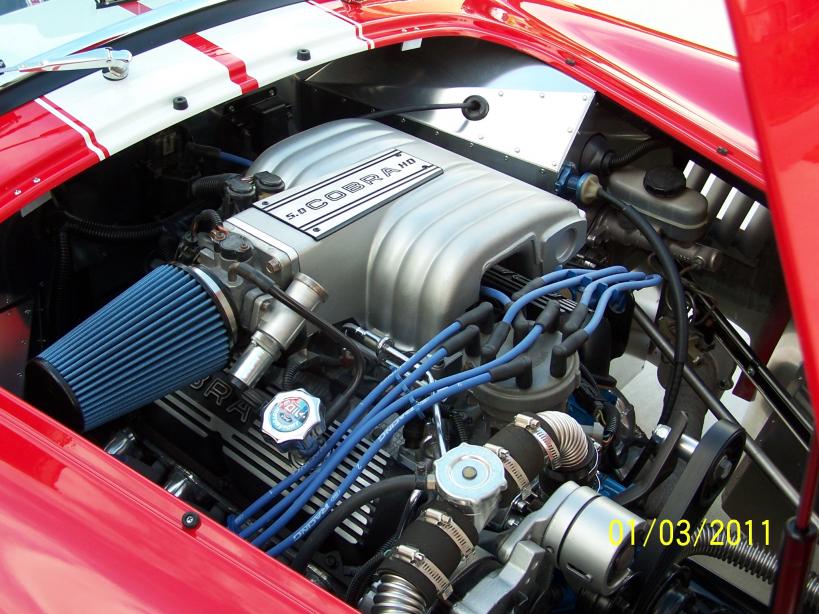 Engine bay w/original speed density setup.