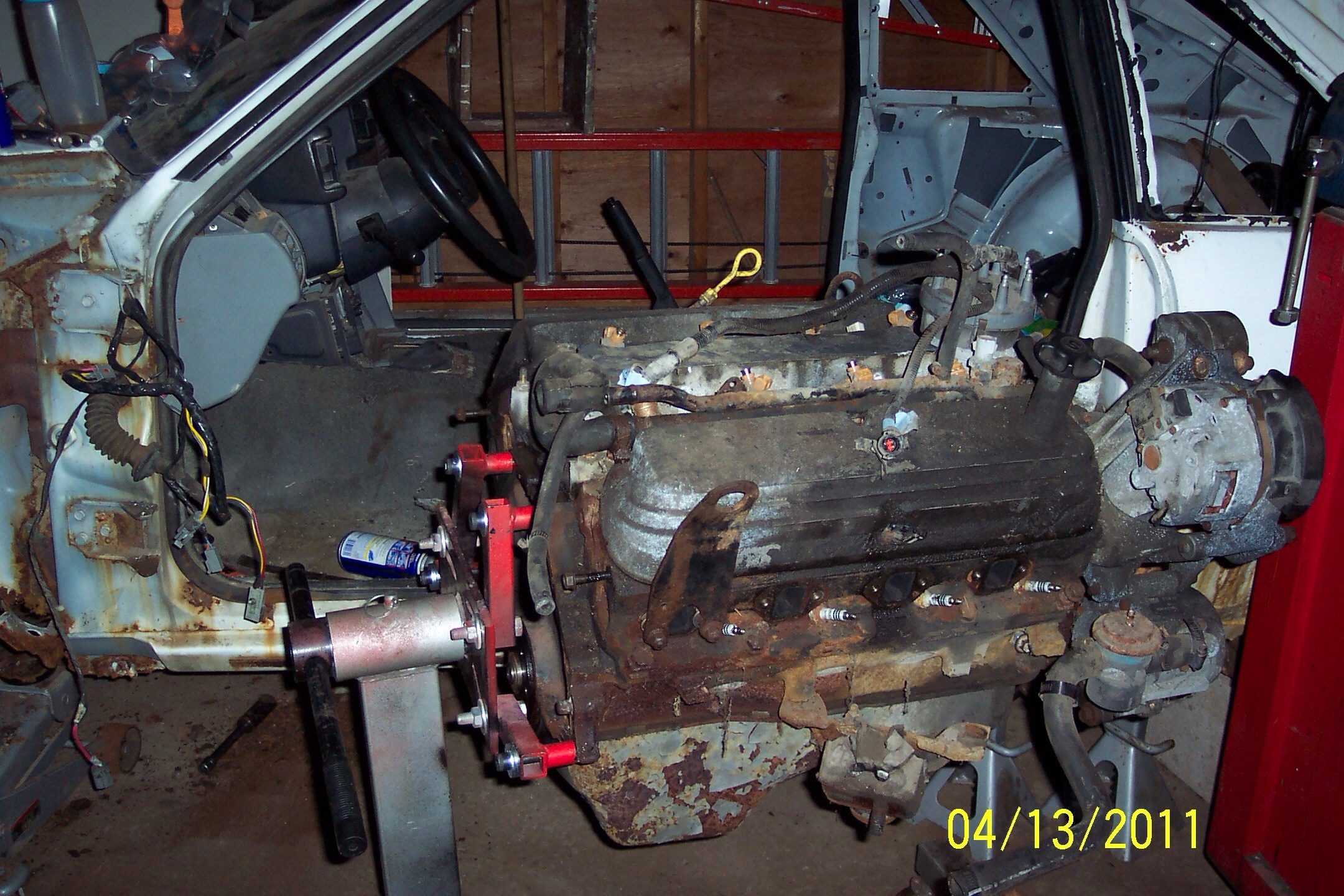 After getting the rusted fuel line together, the engine ran and tranny tested good. Started tear down.