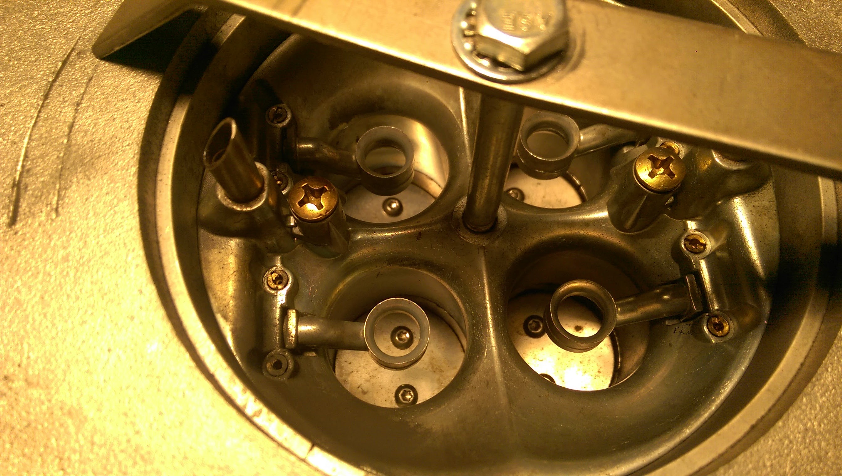 Looking down into carburetor 1