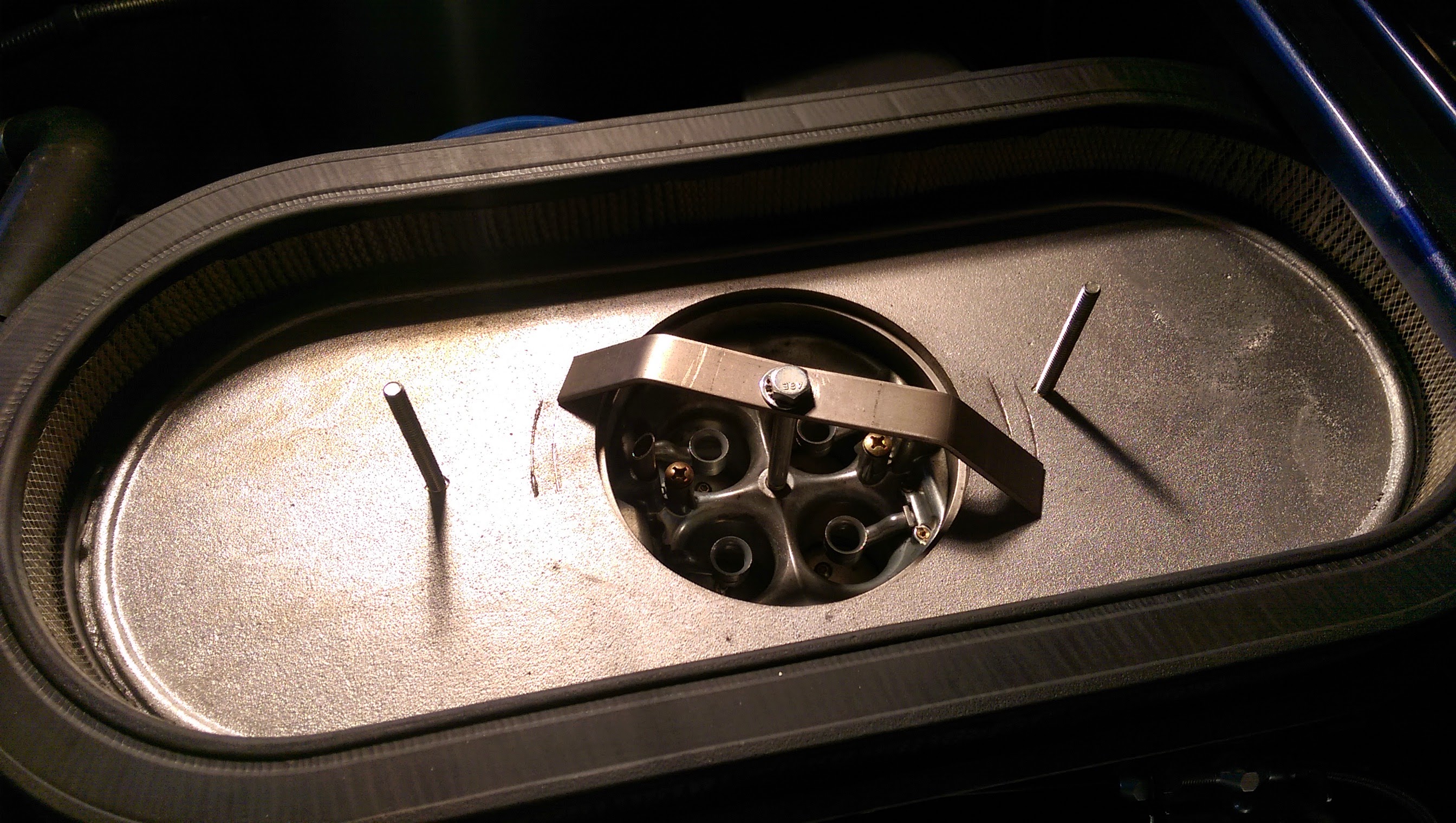 Looking down into carburetor 3