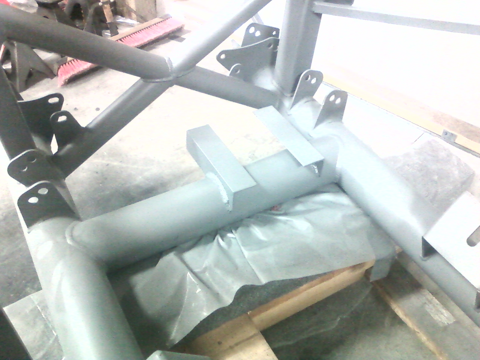 Welded in two 2x2x1/8 angles (8" long) to support battery box