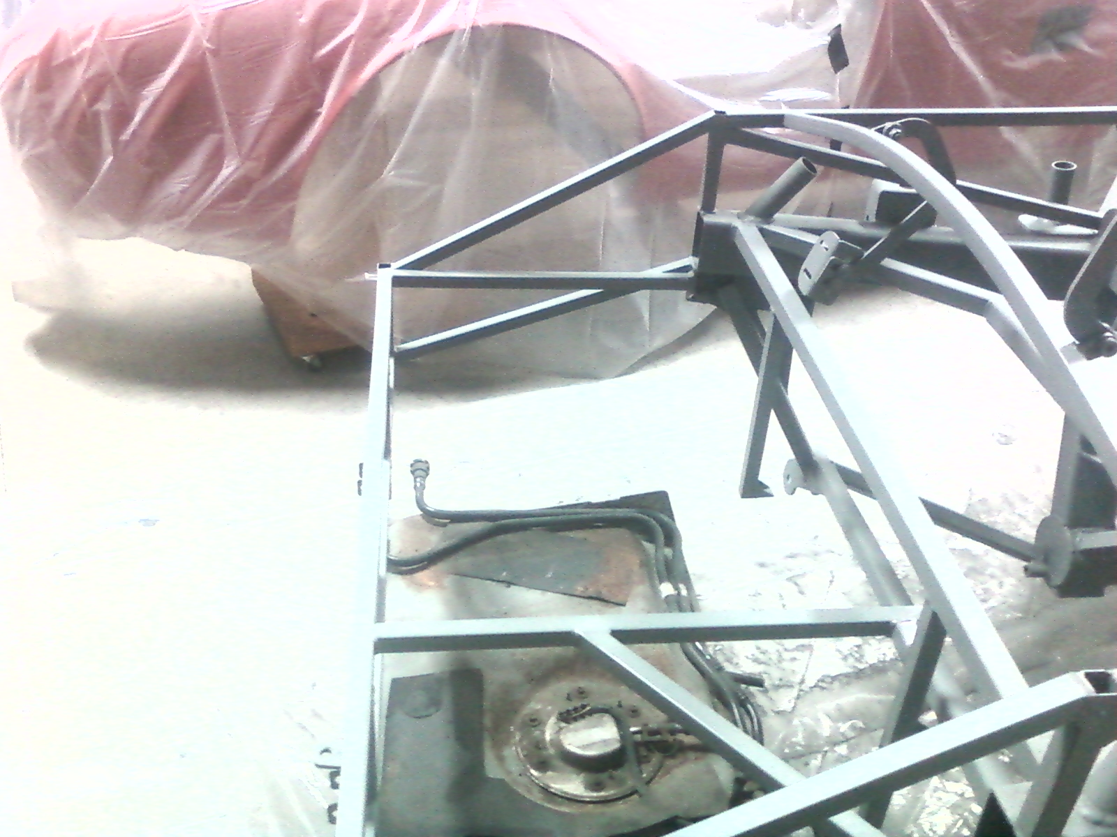 Trunk mod reusing the 3/4" tubing cross bracing originally welded to the frame