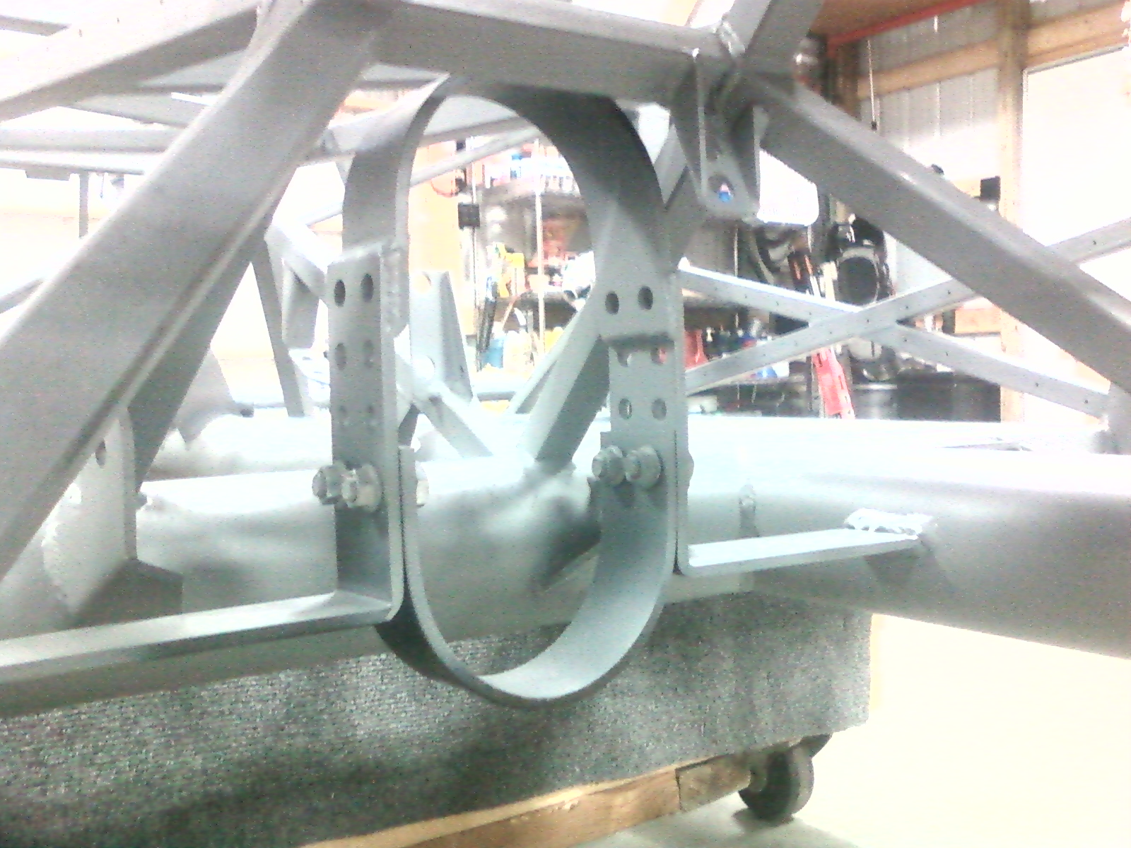 DSL - top half is welded as bolts were close to driveshaft, and hard to loosen / tighten once aluminum panels are installed.