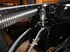 View of passenger heater from the front of the chassis.   Notice the four season's mechanical heater valve that is operated by a choke cable.