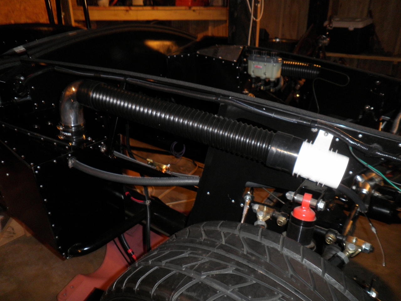 View of passenger heater and attwood blower from the right side of the chassis.