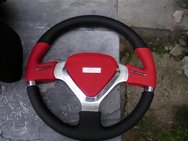 My steering wheel fresh from the upholsterer.