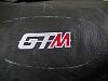 GTM logo sewn into the passanger side dash pod next the air vent. This pic was taken just before the leather was glued onto the pod.