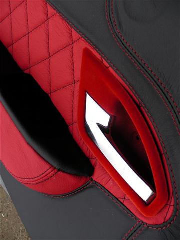 Close up of the door handle coated in velour.