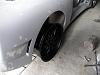 Rear fitment test with the spacer. Will probably have to remove it or shave it down.