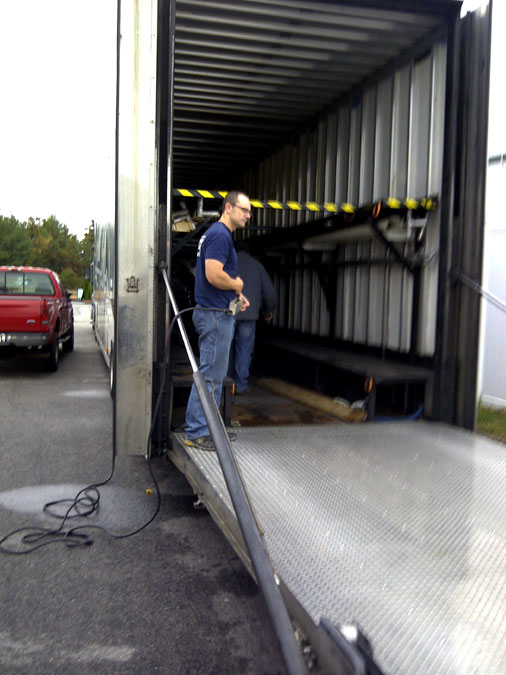 Jesper helps unload the truck.