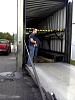 Jesper helps unload the truck.