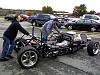 Briian and Jim push the Hot Rolling chassis back into the building.