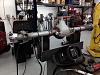 Axle welding jig and special welding process prevent warped housings.