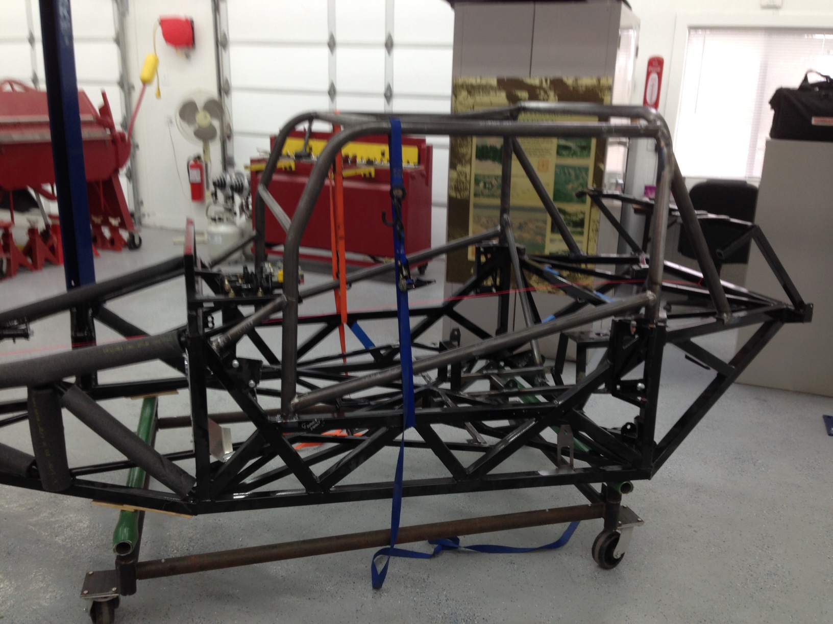 NHRA won't certify a roll cage welded to a FFR chassis -- square tube must be minimum 2".  The NHRA rulebook exception for welding the cage to an OEM chassis didn't fly --  NHRA won't accept the FFR chassis as OEM because "it's not a Henry Ford original".
